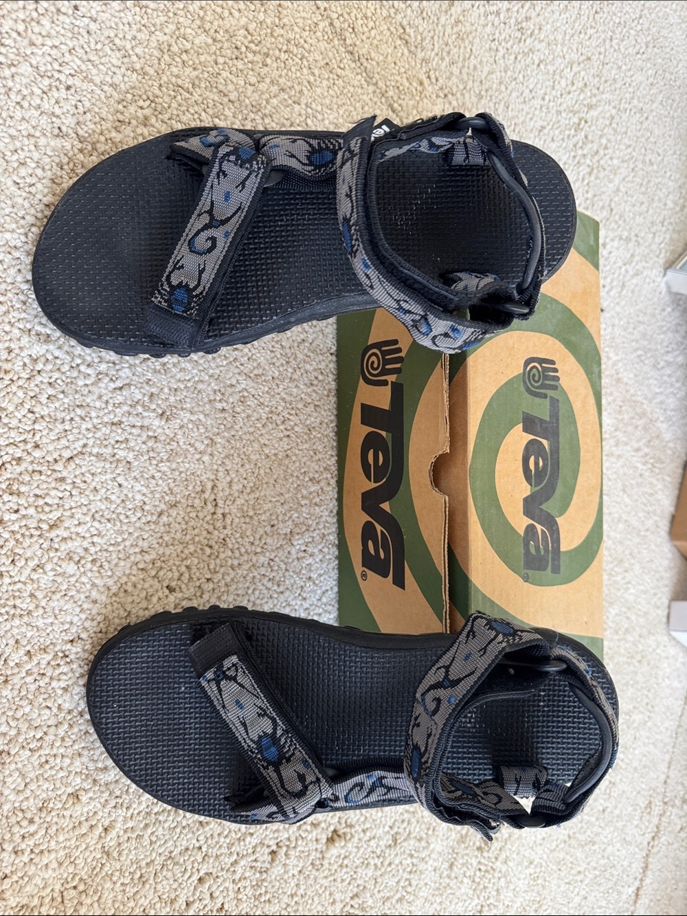 Teva Black Sandals with Gray Patterned Straps and Blue Accents